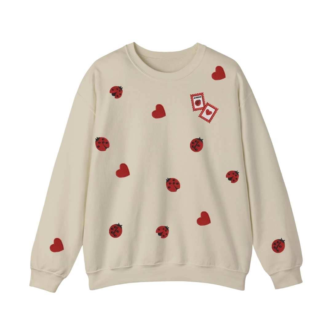 Sudadera cuello redondo mezcla pesada con Bordado "Catarinas y corazones"